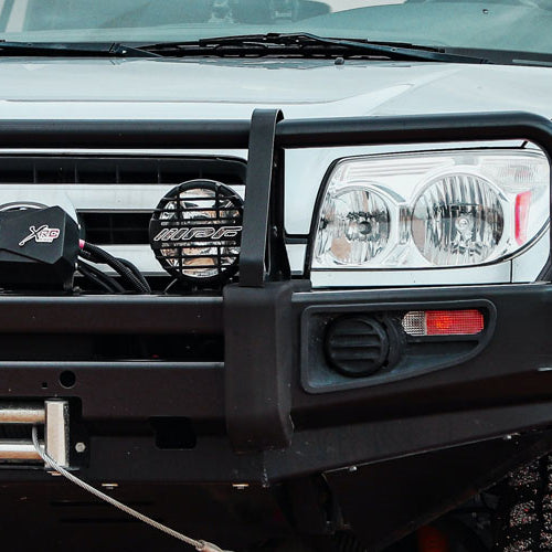 White SUV with off road bumper